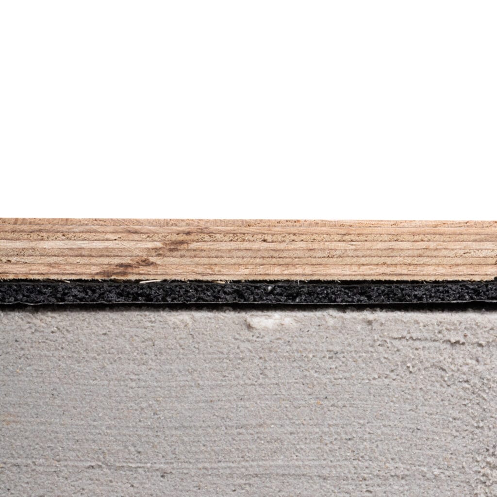Marketing Image of a Cross Section of a flooring underpad installation by Jules Design