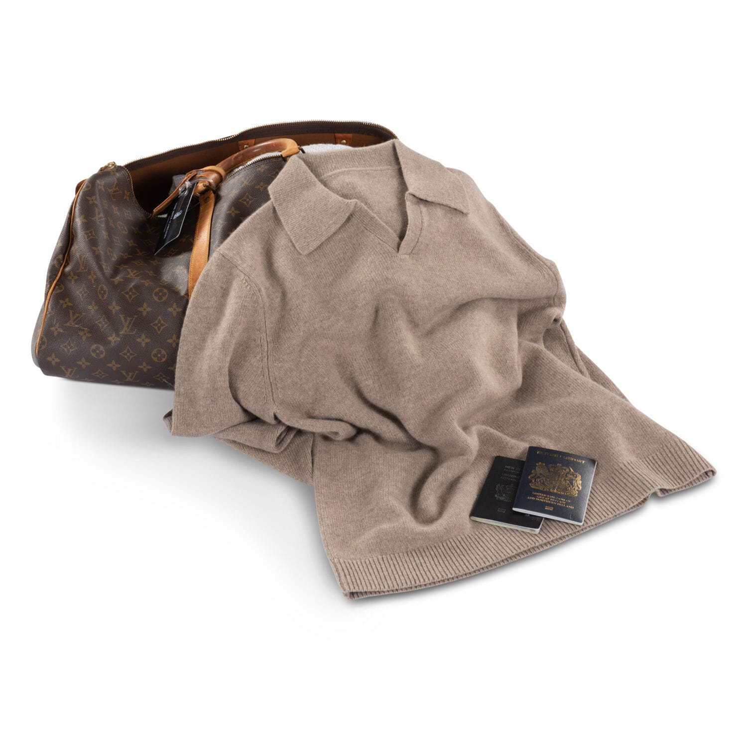 Luxury cashmere sweater flatlay for Toronto fashion photography sell sheet and lookbook — premium travel lifestyle product styling