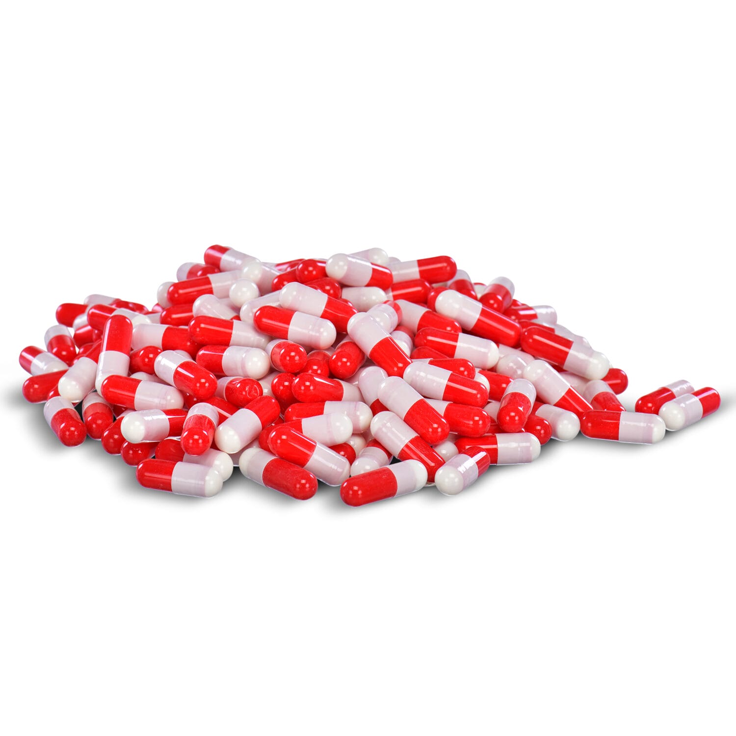 High-resolution image of red and white pharmaceutical capsules in bulk – Toronto medical product photography for supplement packaging, pharmacy marketing, and eCommerce use