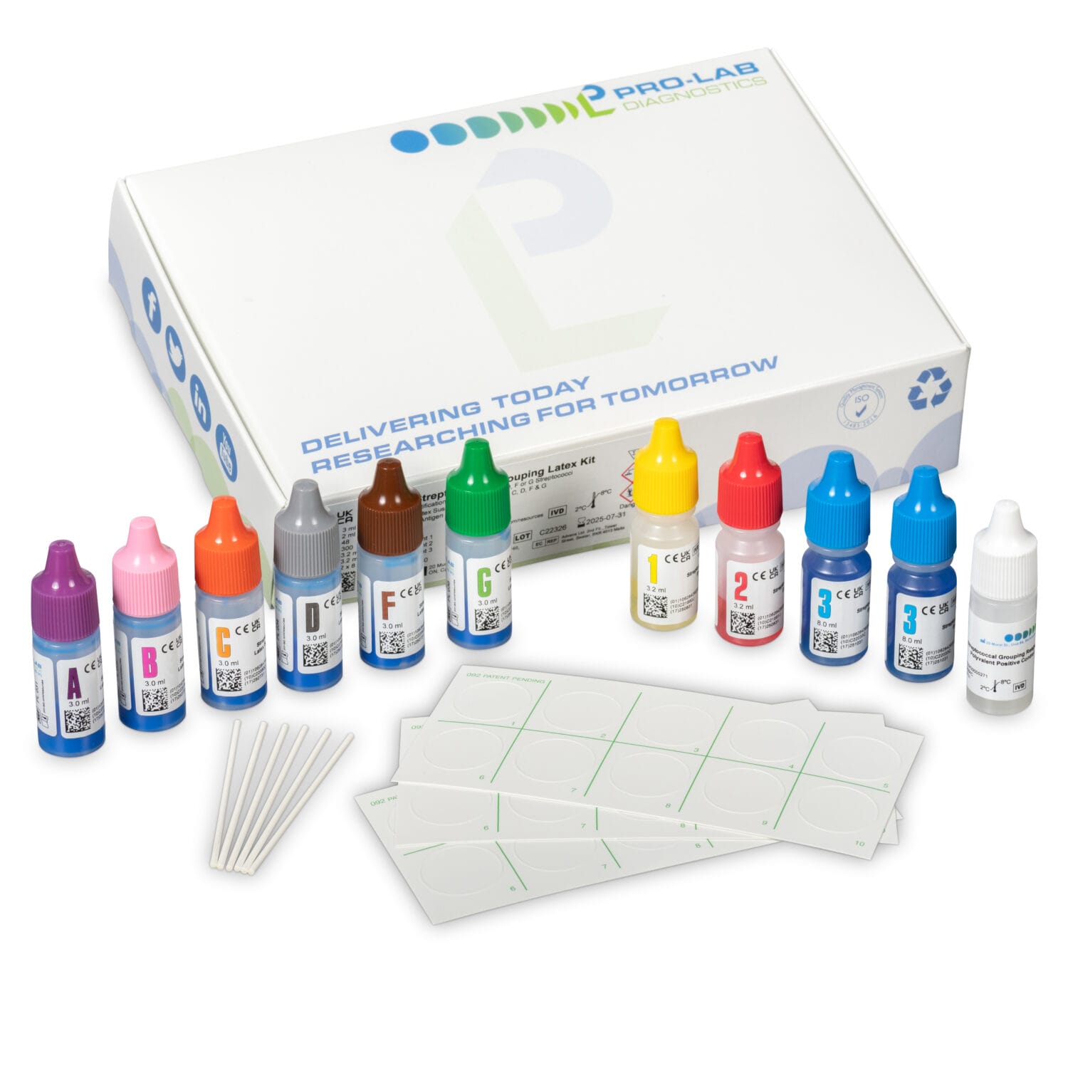 Streptococcal latex grouping test kit photographed in Toronto studio – includes color-coded reagent bottles, swabs, labels, and branded packaging for clinical diagnostic supply catalogues and ecommerce u